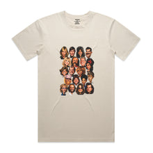 Load image into Gallery viewer, A light beige crewneck t-shirt featuring a graphic print of a 4x5 grid of various illustrated faces, displayed flat against a pale beige white background.
